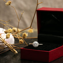 Load image into Gallery viewer, Diamond ring in a red box with dried flowers in the background