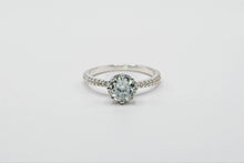Load image into Gallery viewer, Diamond ring on a light gray background

