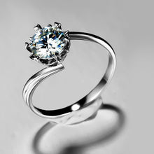 Load image into Gallery viewer, Silver ring with a large diamond on a gray background
