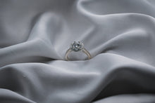 Load image into Gallery viewer, Diamond ring on gray fabric
